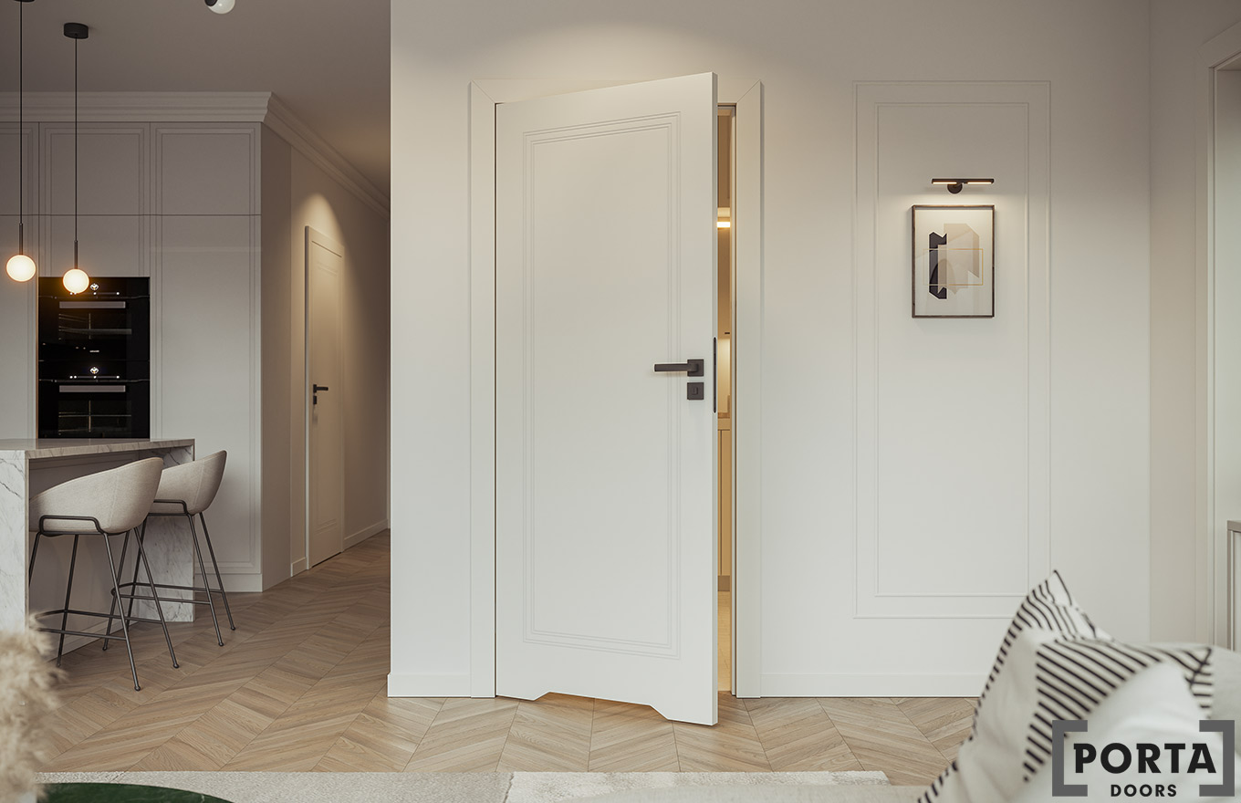 Nowoczesne białe drzwi wewnętrzne PORTA w eleganckim wnętrzu z jasną podłogą ułożoną w jodełkę.